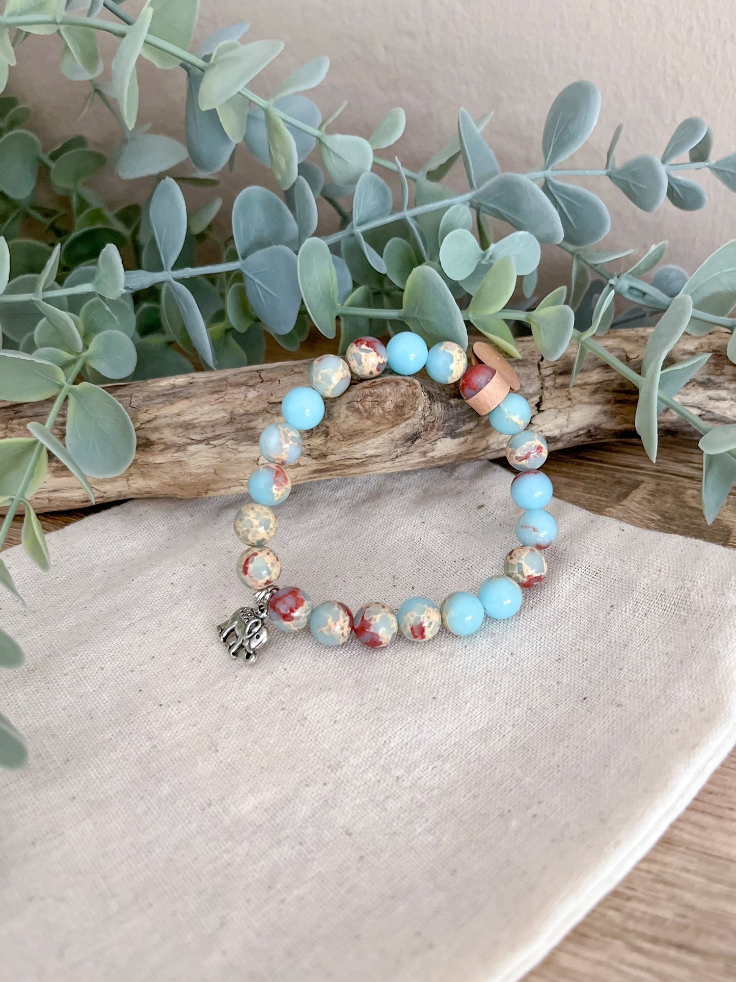 Naturstein-Armband Hellblau- Rost Meliert mit Elefantenanhänger - Siliblu Boutique & Atelier