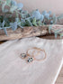 Ohrringe vergoldet mit Beige - Schwarzem Naturstein - Siliblu Boutique & Atelier